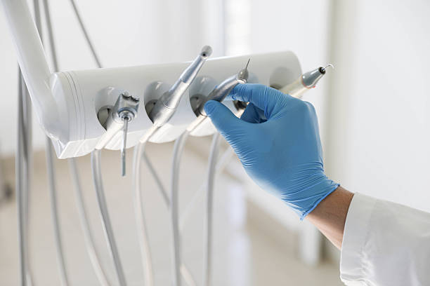Professional Tooth Extraction technician working in Ionia, MI